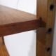 Danish wall shelving system in teak from the 1960s.