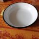 Enamelled dish with handles