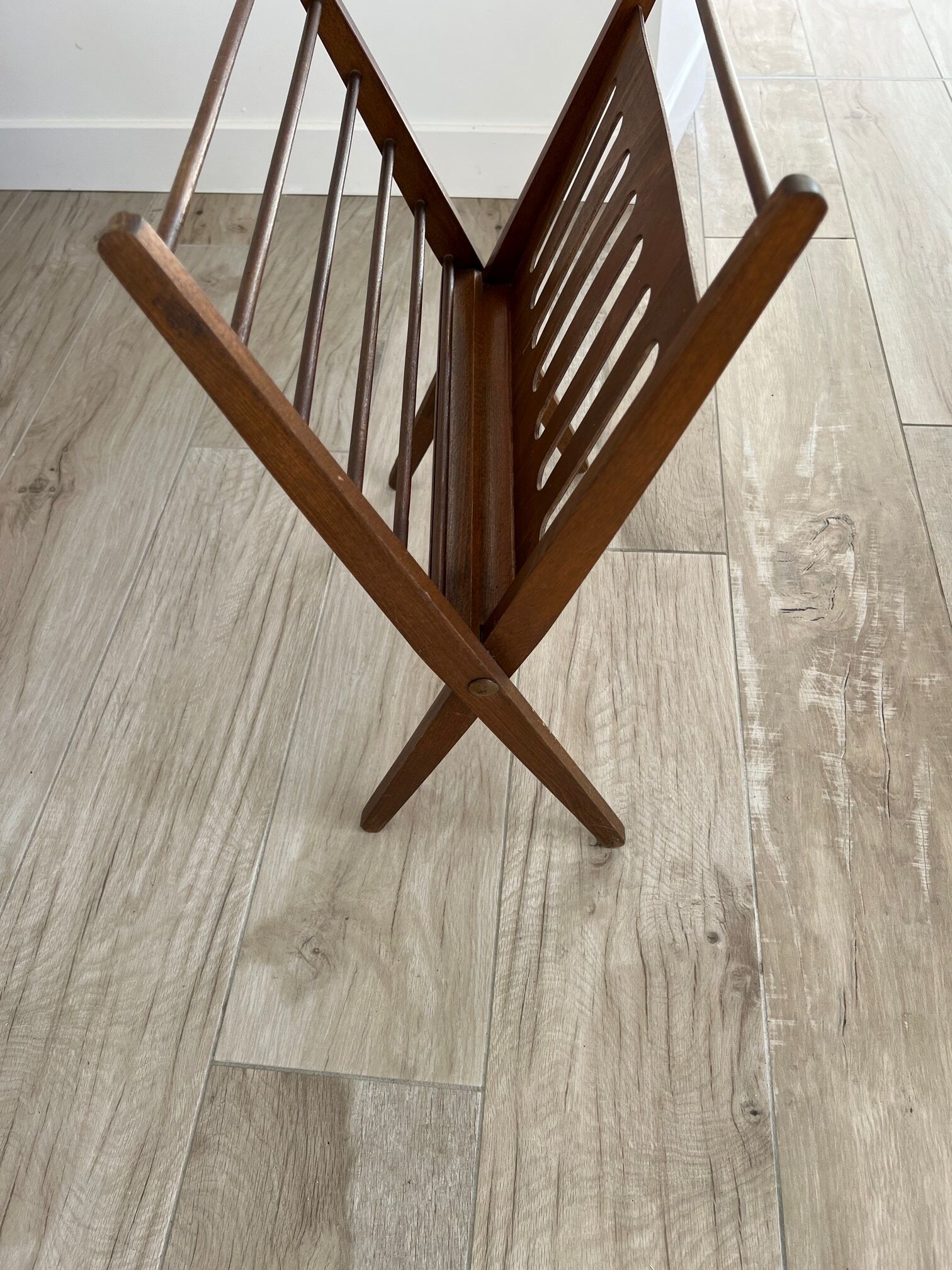 Folding magazine door