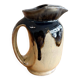 Antique carafe in flamed enamelled ceramic