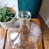 Transparent demijohn vase