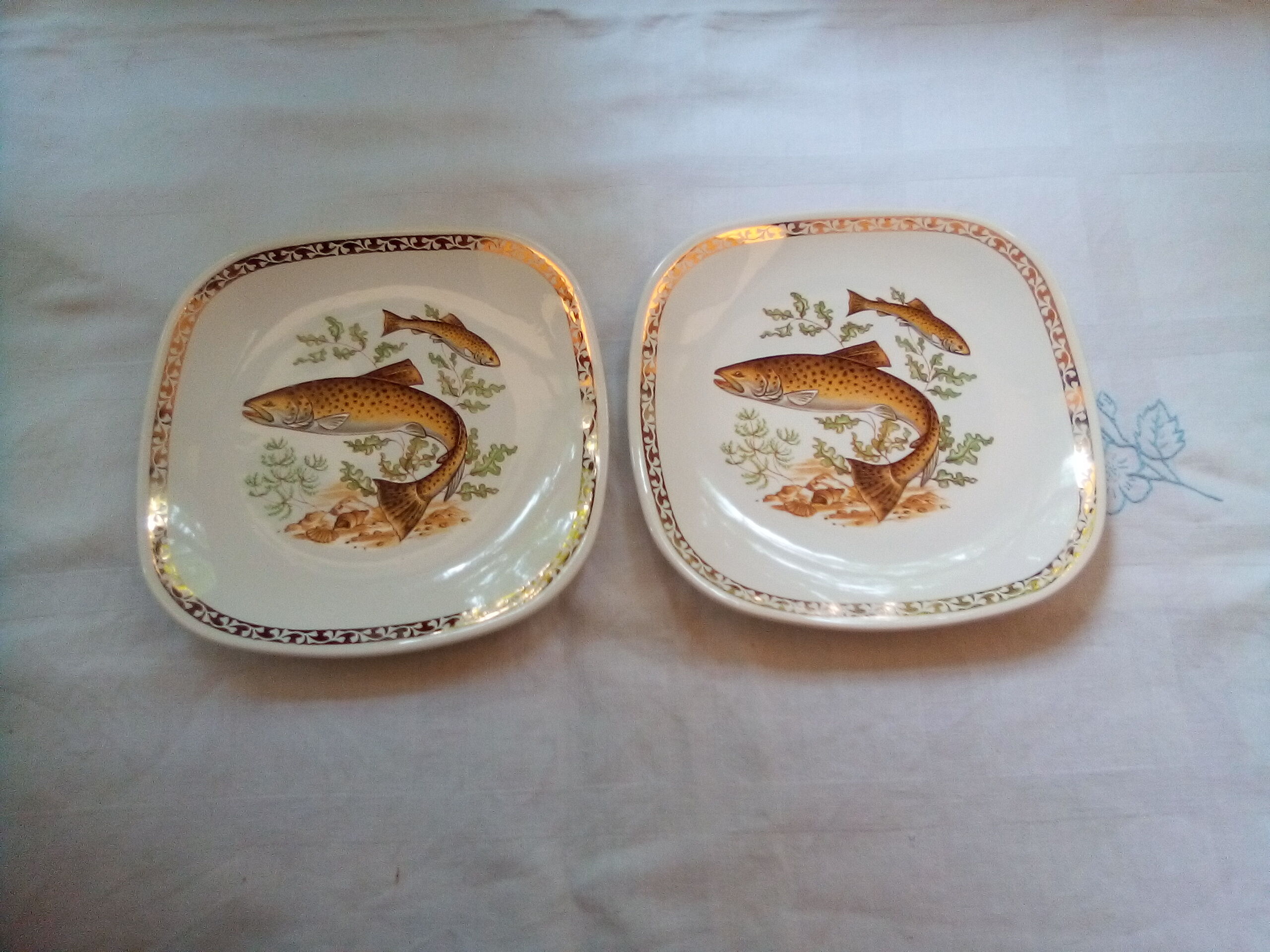 Set of 12 Longchamp plates and fish dish