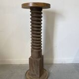Old wooden press screw, round base