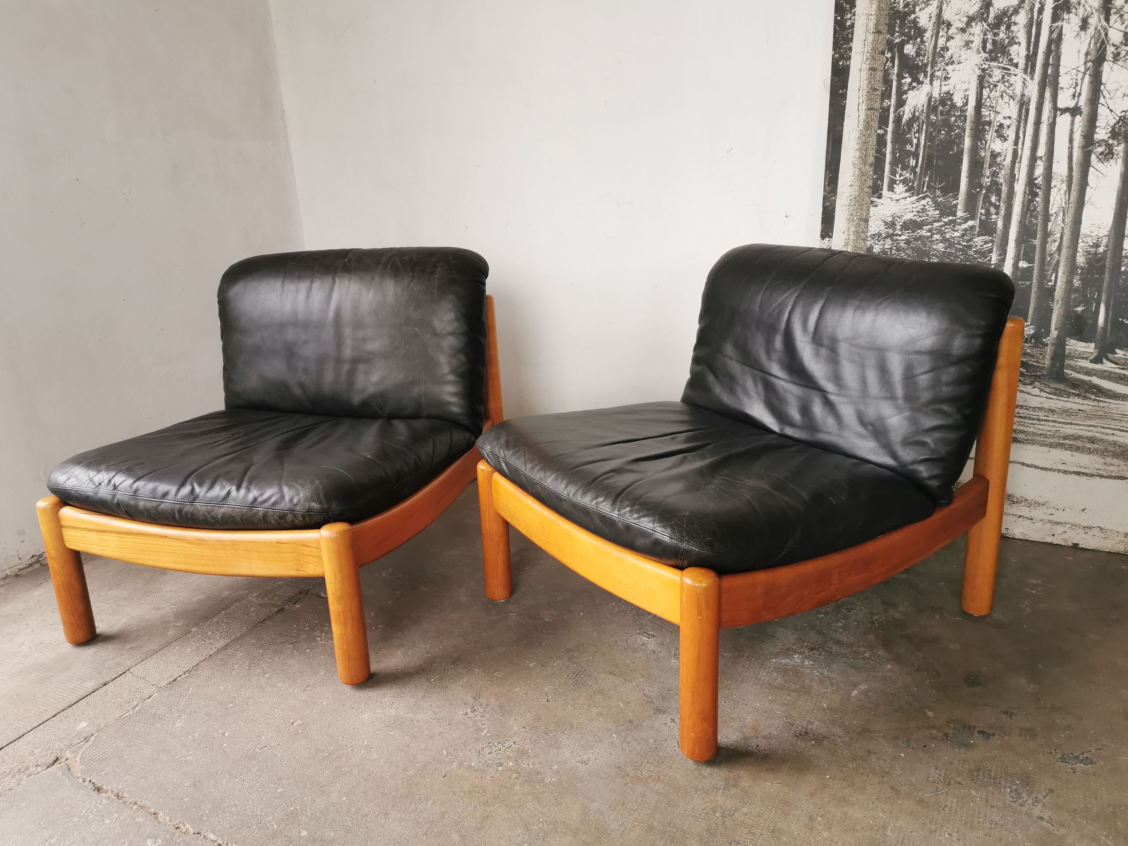 Pair of designer leather armchairs 80s