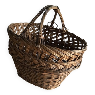 Set of 2 brown wicker baskets from the 1960s — decorative weaving and double handles.