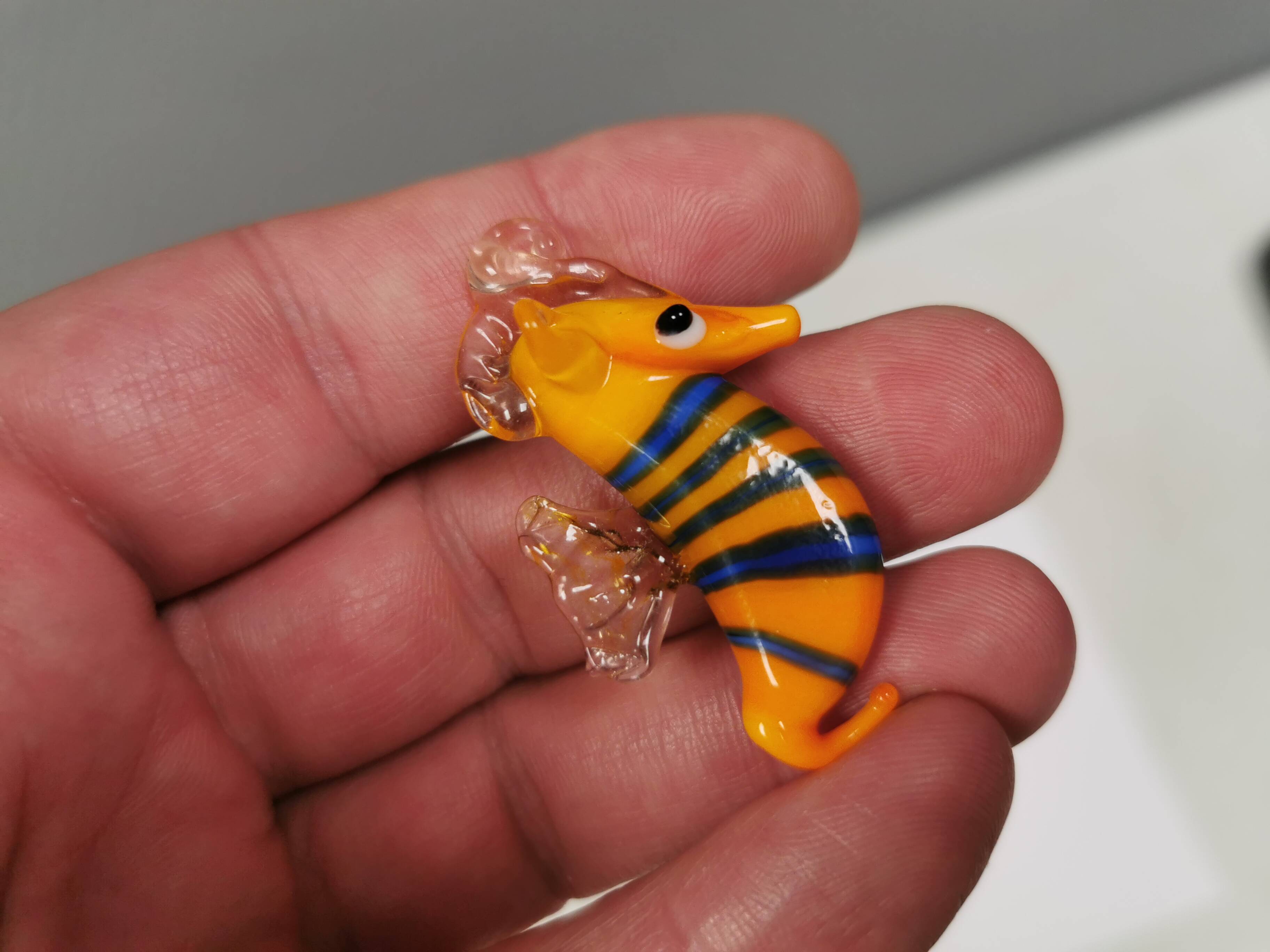 Six small Murano Seahorses in glass.