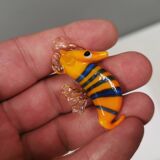 Six small Murano Seahorses in glass.