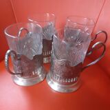 4 glasses engraved on their silver metal support;