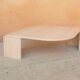 Table basse vintage en travertin par les éditions Roche Bobois