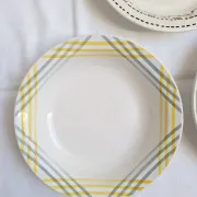Shallow dish Gien orange and black model 456, Moulin des Loups yellow and grey.