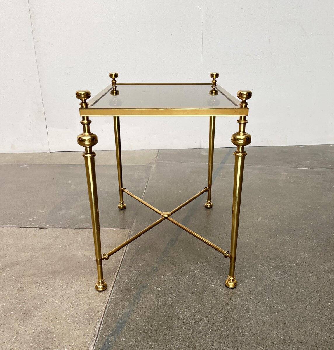 Mid-century Hollywood neoclassical brass and glass side or bedside tables attributed to Vereinigte Werkstätten, Germany, 1960s, set of 2.