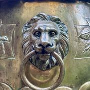 Large brass lion planter with a hallmark from the 19th century.