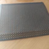 Perforated sheet metal tray circa 1950