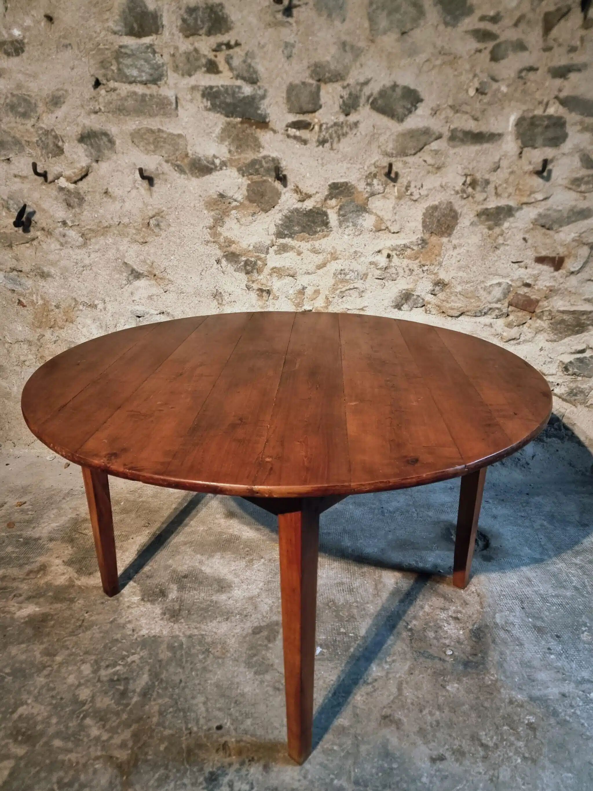 Vintage French round dining table in cherry wood, circa 1920.