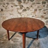 Vintage French round dining table in cherry wood, circa 1920.
