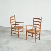 Set of 2 oak and wicker armchairs, mid-20th century.