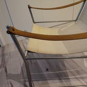 Scandinavian living room armchair in tubular chrome and leather
