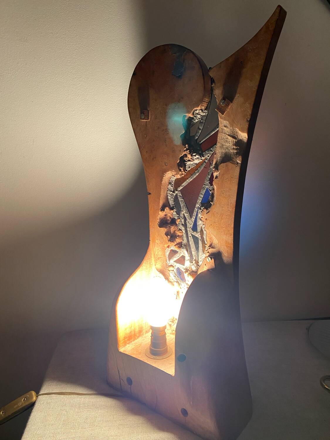 Carved wooden lamp and stained glass