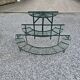 Old half-moon wrought iron plant holder