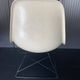 Eames lounge chair white fibre parchment base cat’s cradle Herman Miller