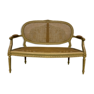 Braided wooden bench.