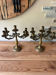 Pair of large 5-light candlesticks in patinated brass, classical style.