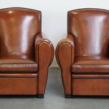 Set of 2 sheepskin design armchairs in the moustache model, in very nice condition