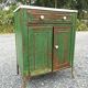 Patinated metal furniture