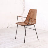 Vintage wicker chair with armrests from the 1960s