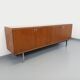 Vintage modernist enfilade in rosewood and chrome metal from the 60s and 70s.