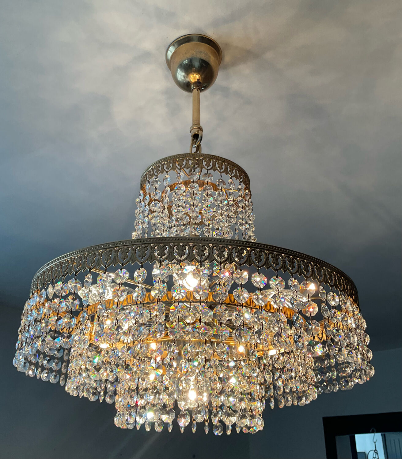 Brass chandelier and crystal tassel waterfall