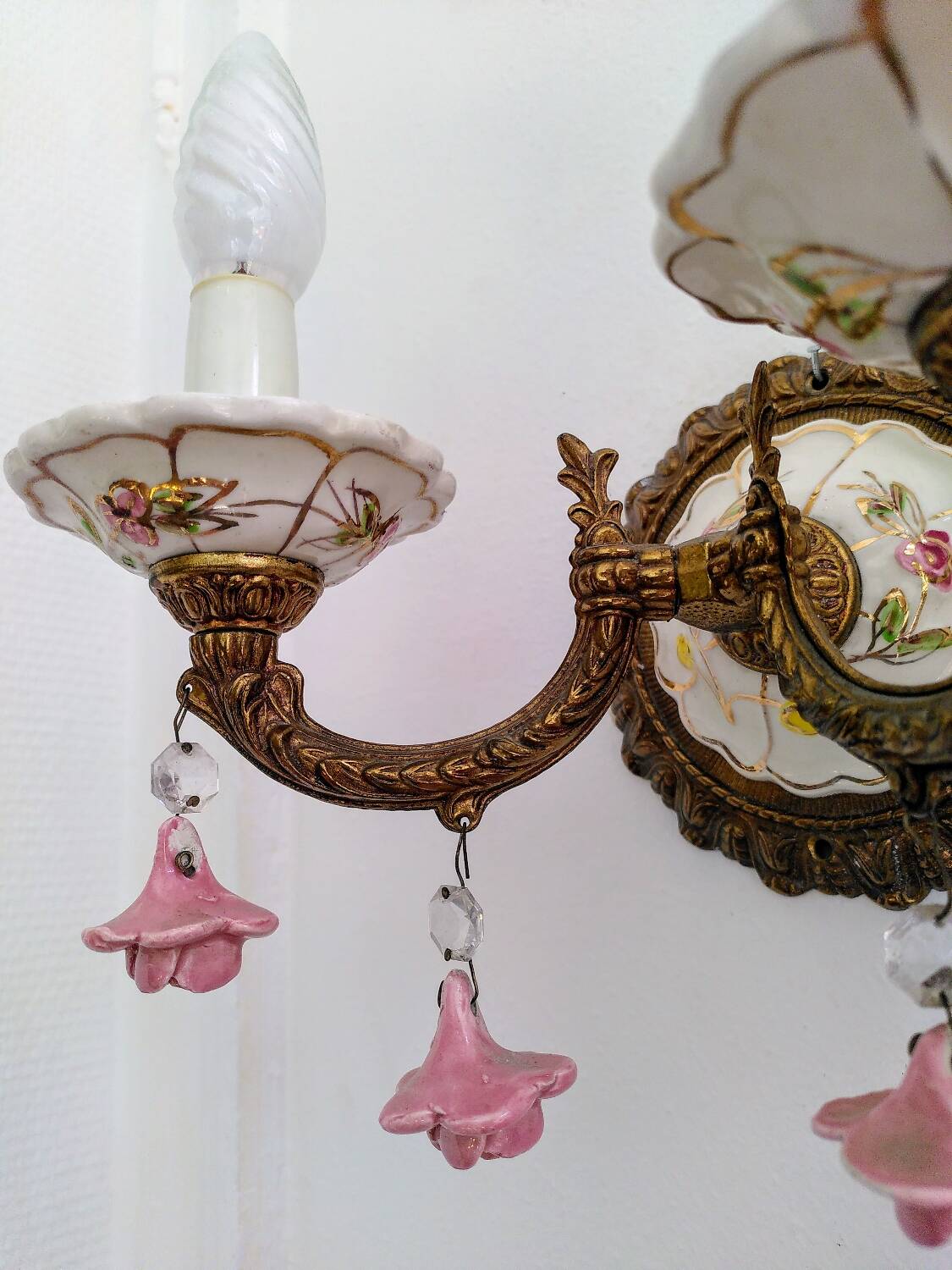 Pair of brass and porcelain wall lights