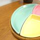 Pastel color bowls set in rattan basket vintage