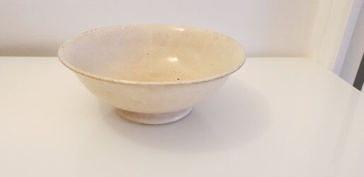 Old porcelain dish on pedestal