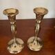 Three vintage brass candle holders