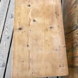 Raw wood and taupe coffee table