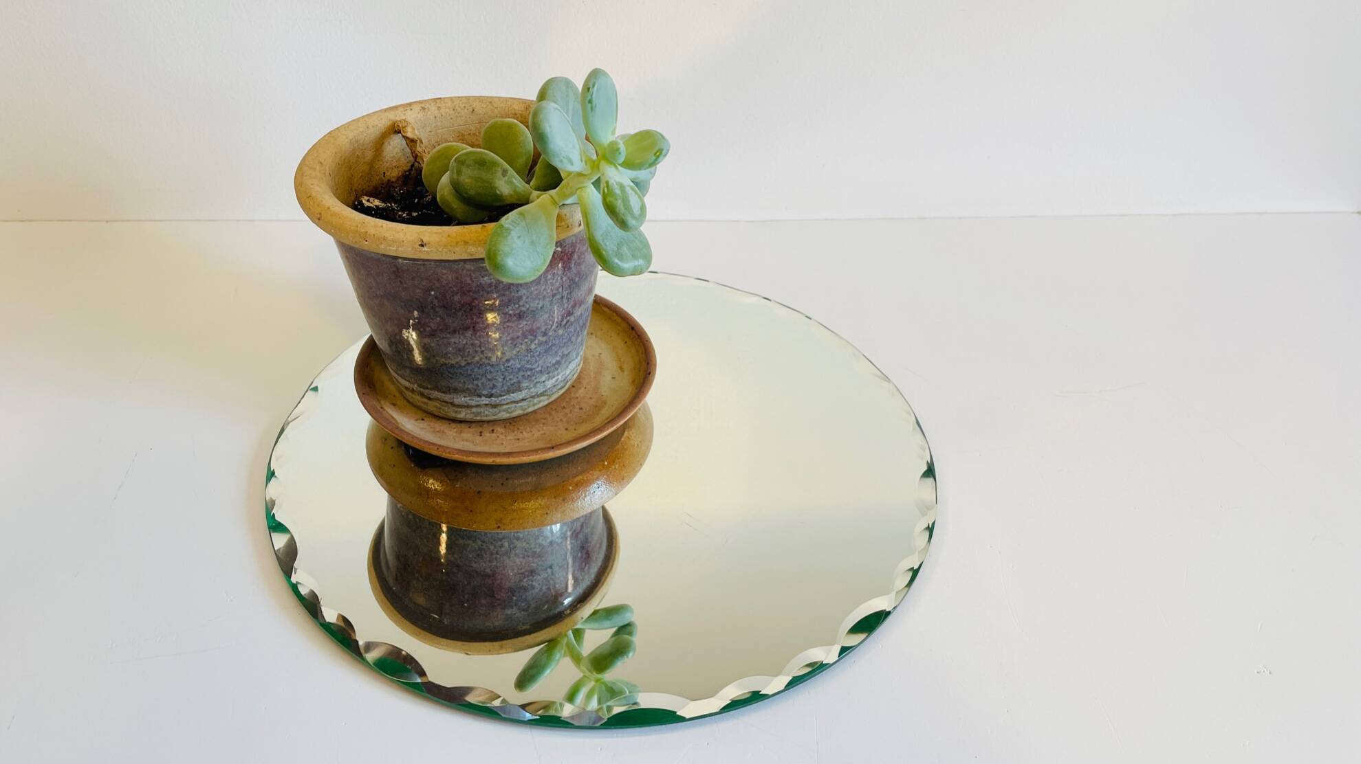 Vintage round and beveled table mirror