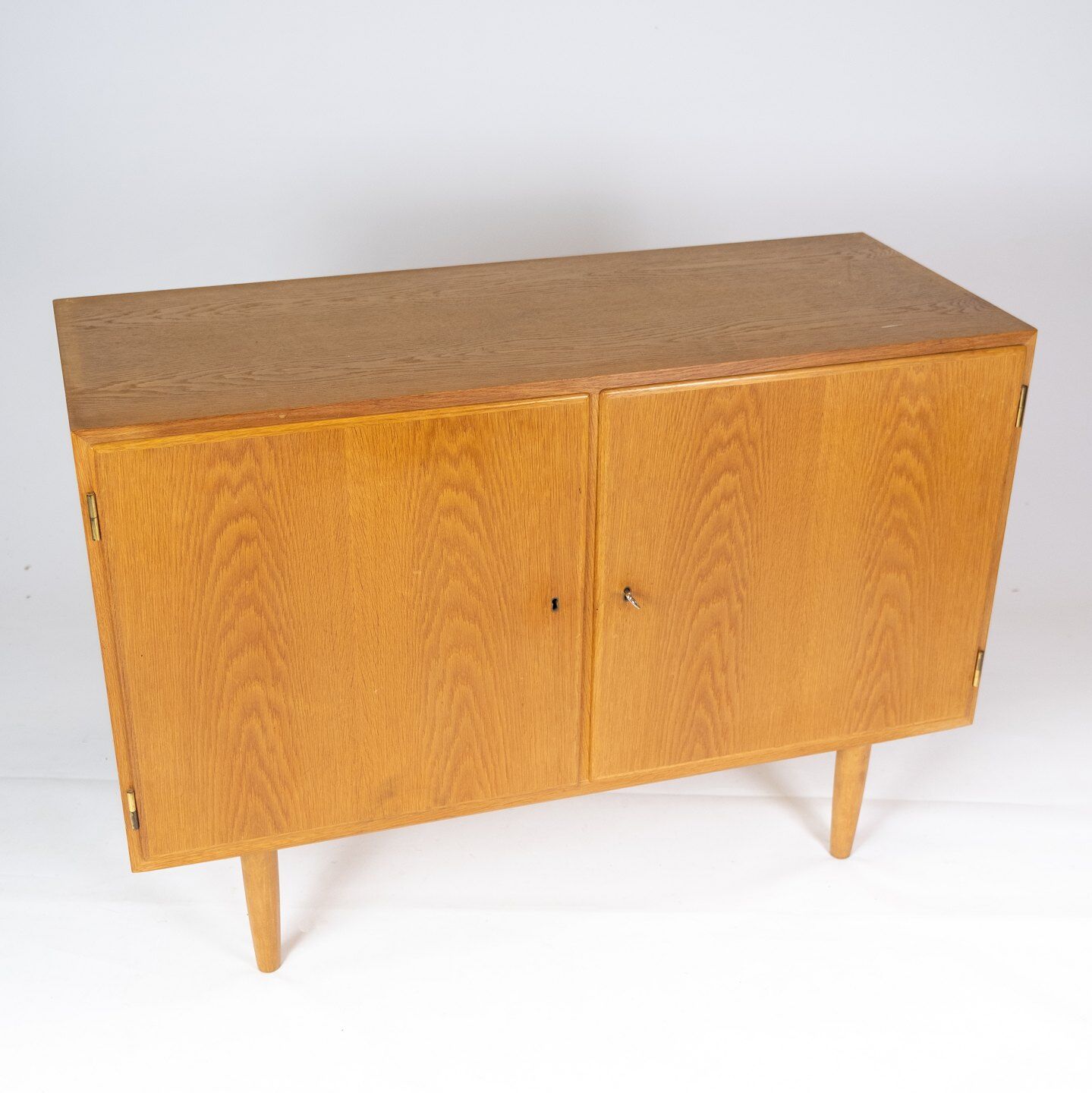 Sideboard in oak designed by Poul Hundevad from the 1960s.