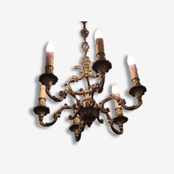 Chandelier in gilded with six arms chiseled bronze.