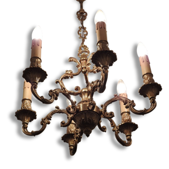 Chandelier in gilded with six arms chiseled bronze.