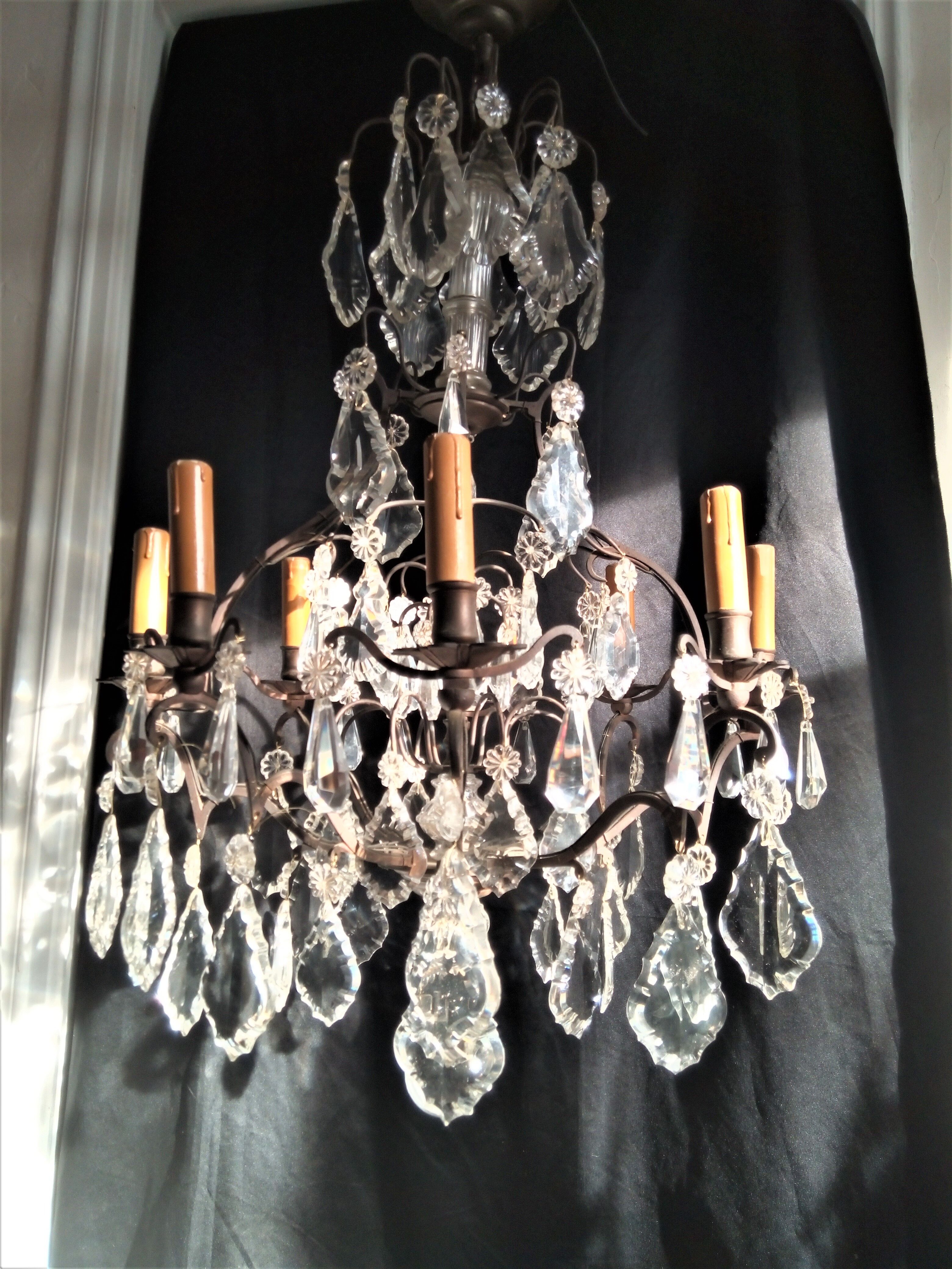 Old chandelier with tassels, bronze and crystal, 8 lights. Louis XV style.