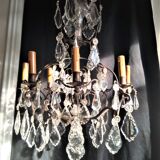 Old chandelier with tassels, bronze and crystal, 8 lights. Louis XV style.