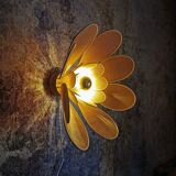 Flower wall light made of rattan and nude linen petals