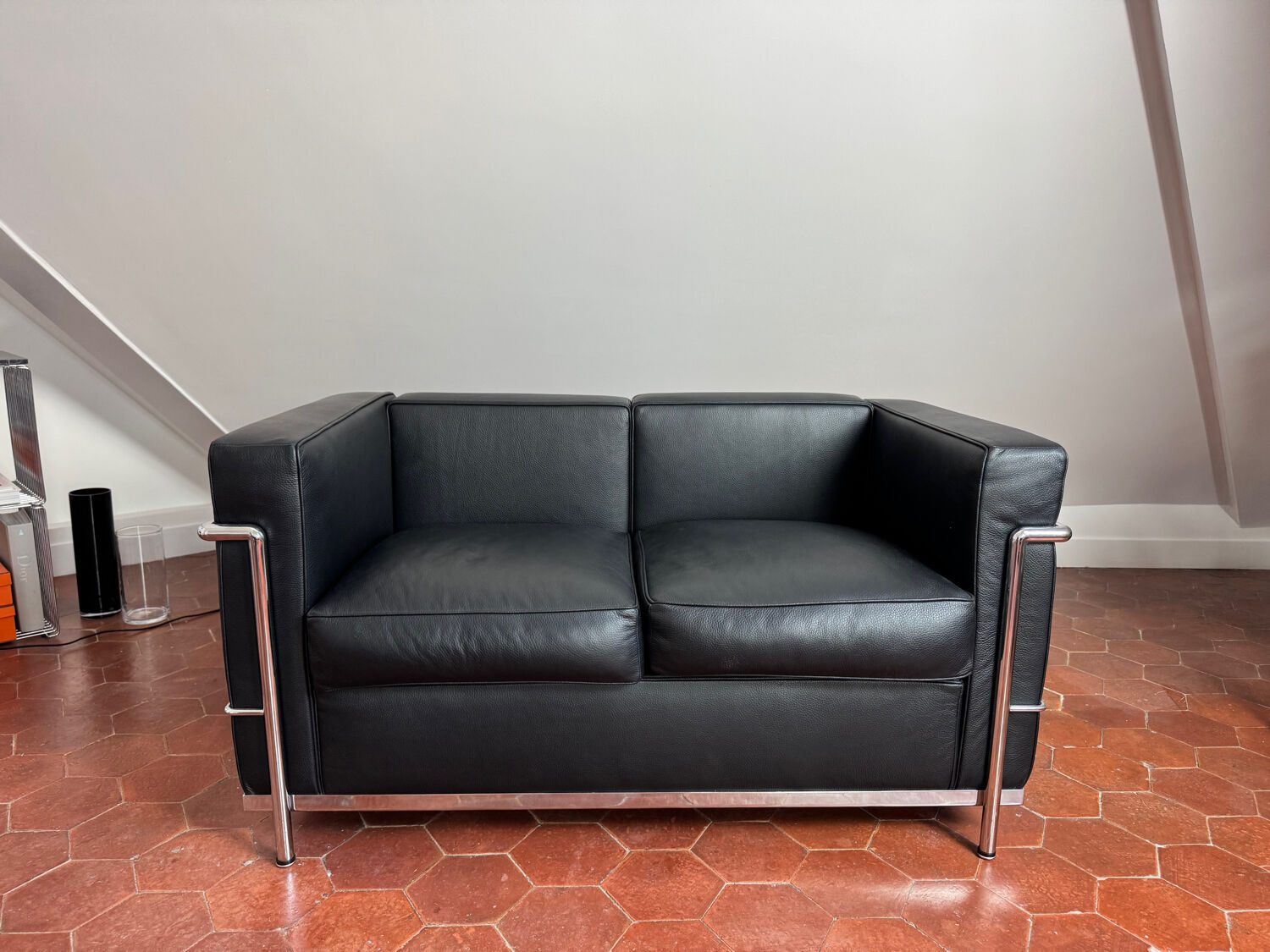 For sale: designer two-seater sofa.