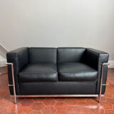 For sale: designer two-seater sofa.