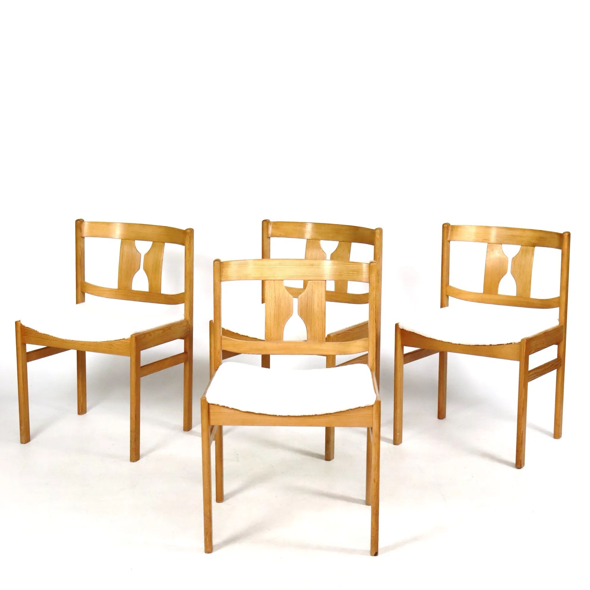 Set of four pine chairs from the 1960s.
