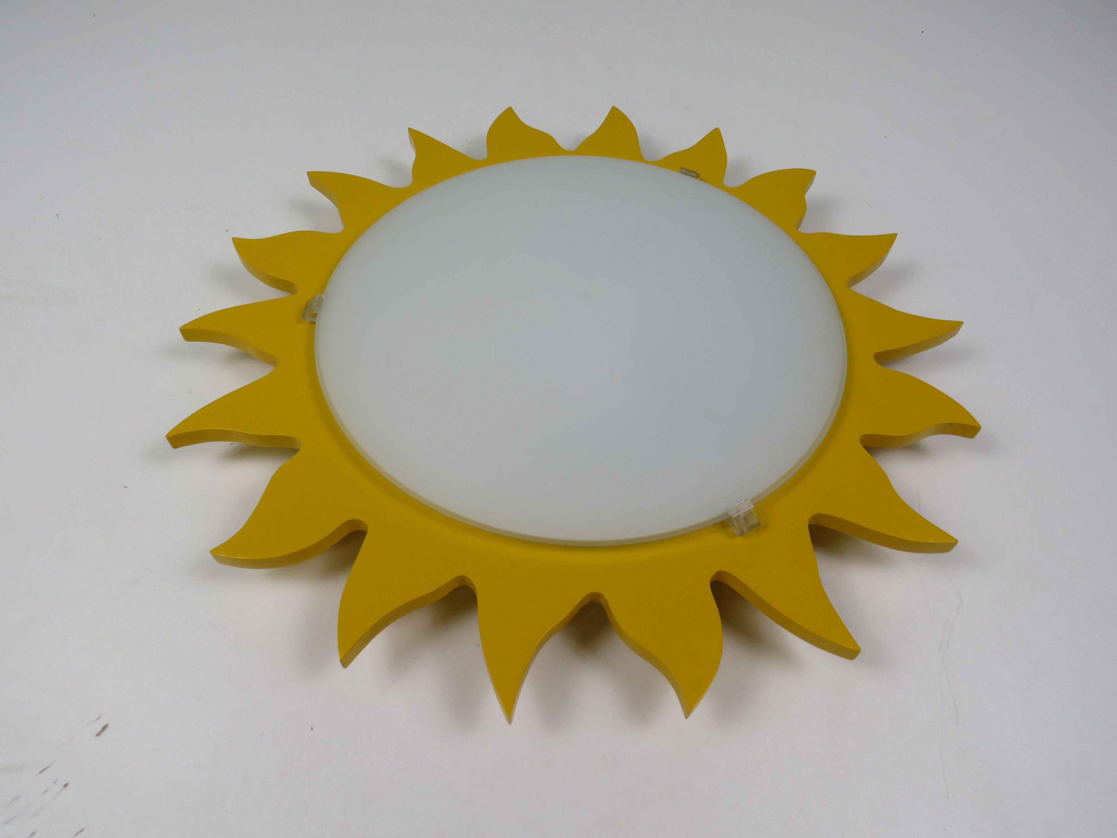 Vintage "sun" ceiling light Massive Belgium in opaline glass and lacquered wood.