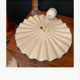 Blue and white pleated ceramic suspension