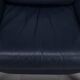 Danish teak and navy blue leather lounge chair from Komfort, 1970s