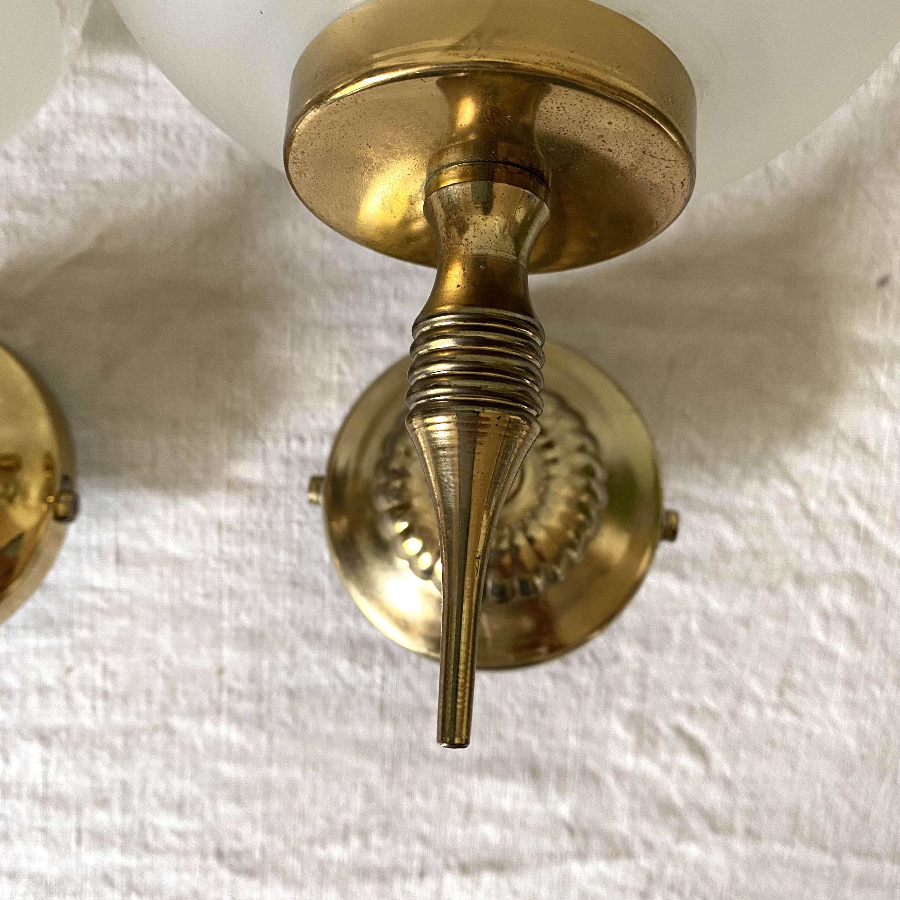 Pair of glass and brass wall lights